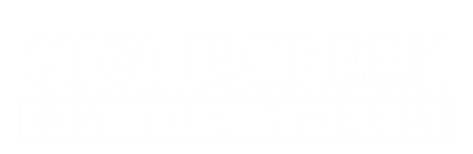 a black and white logo for stone creek on the green
